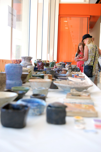 A collection of ceramics created by the young artist Creative Clay Studio class. 