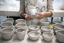 A student working in the ceramics studio during an evening class. 