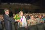 Franny Taft receiving flowers from CIA's president Grafon Nunes